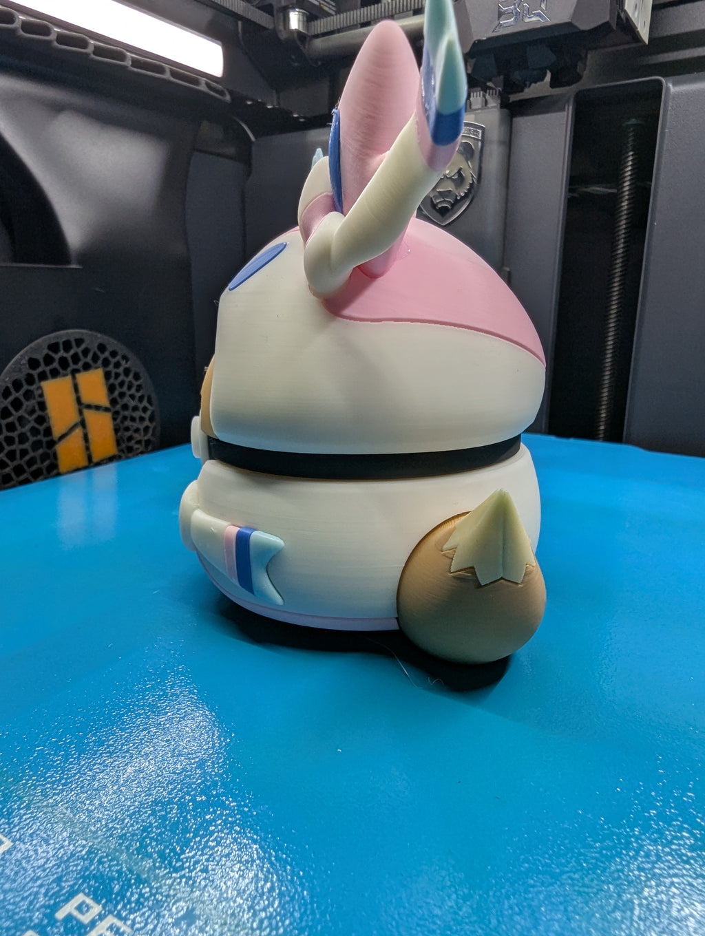 Eevee (Sylveon Poncho) Pokéball Display Model – 3D Printed Collectible Figure